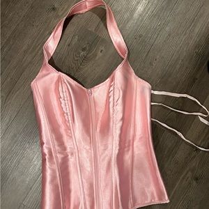 Pink Corset size large but run small. Size 4-5